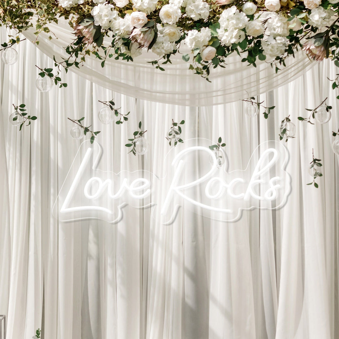 "Love Rocks" Words Neon Sign for Weddings & Proposals