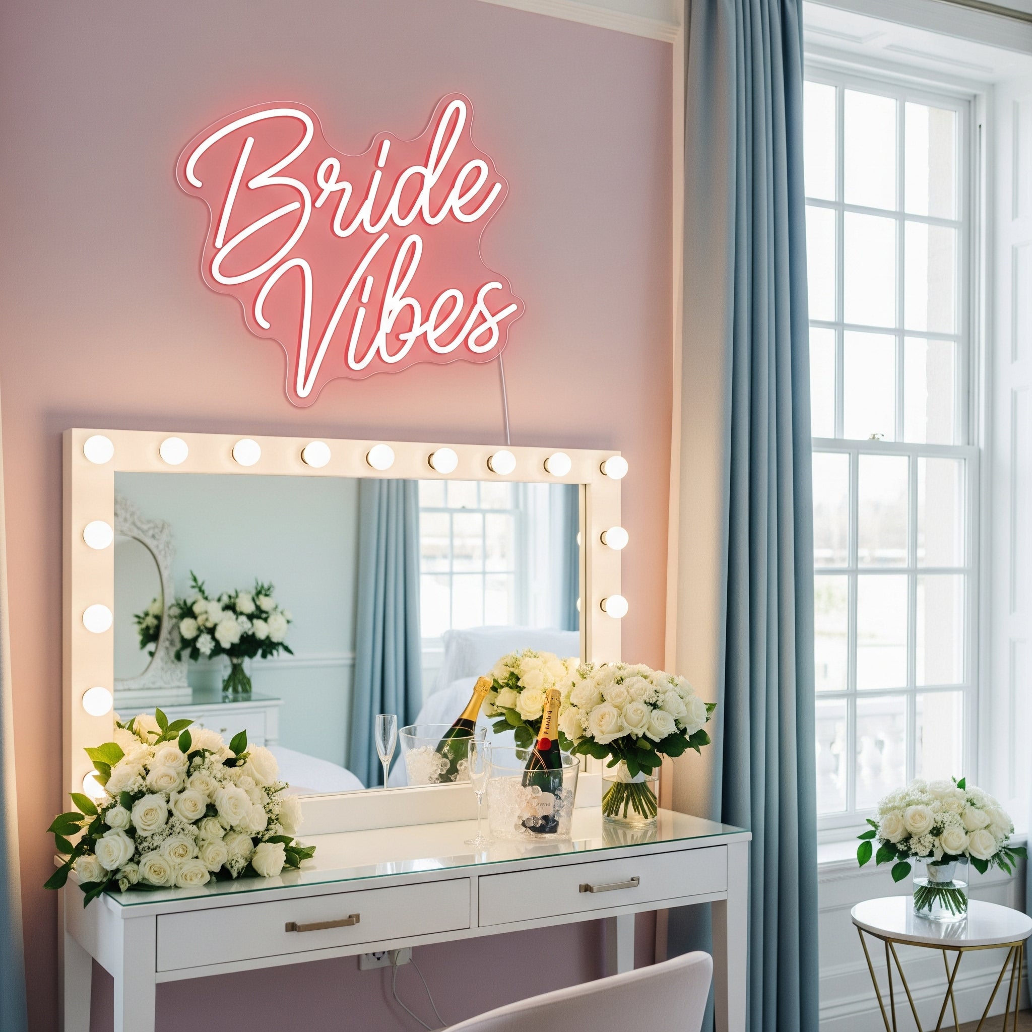 Bridal vanity with 'Bride Vibes' neon sign and bouquet of white roses
