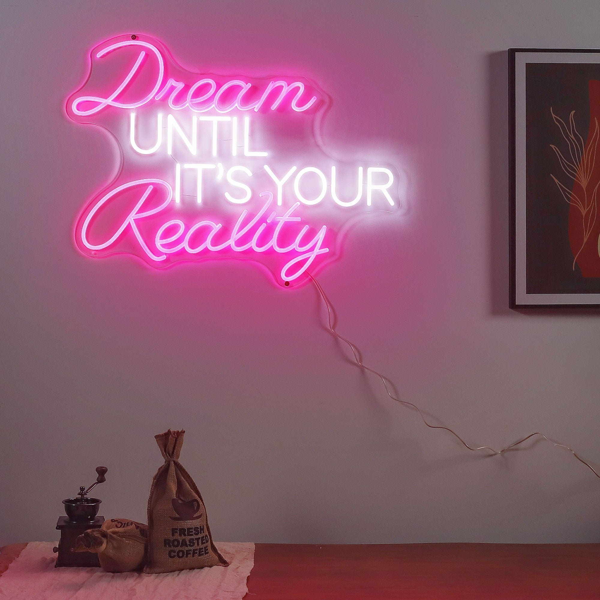 Neon Sign That Reads "Dream Until It's Your Reality"