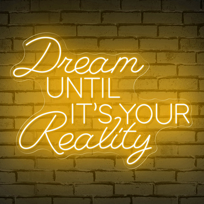 Neon Sign That Reads "Dream Until It's Your Reality"