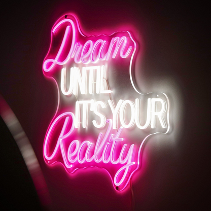 Neon Sign That Reads "Dream Until It's Your Reality"